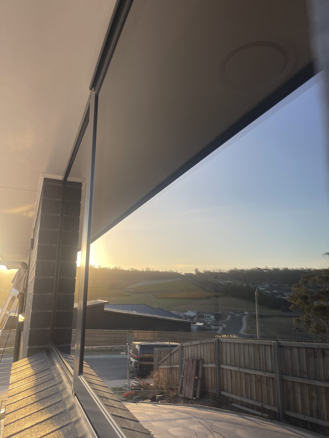 Streak-free glass and balustrade at sunset after professional window cleaning, Greater Hobart