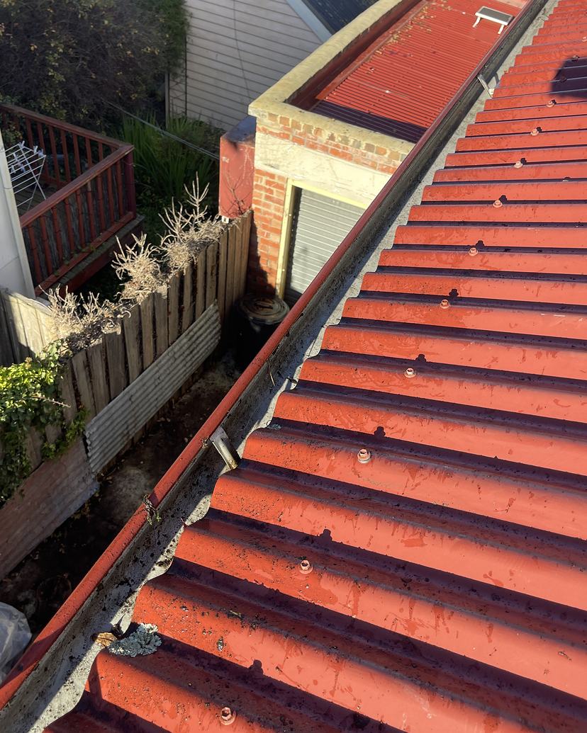 The same West Hobart gutter cleared and flushed after cleaning