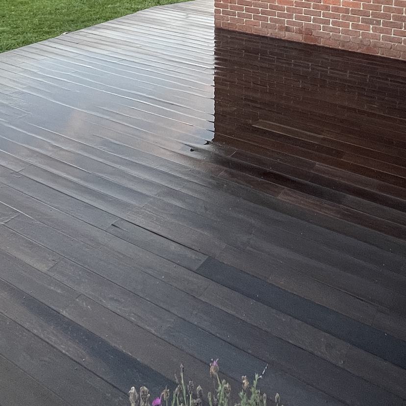 The same hardwood deck in Snug after washing, rich timber colour back