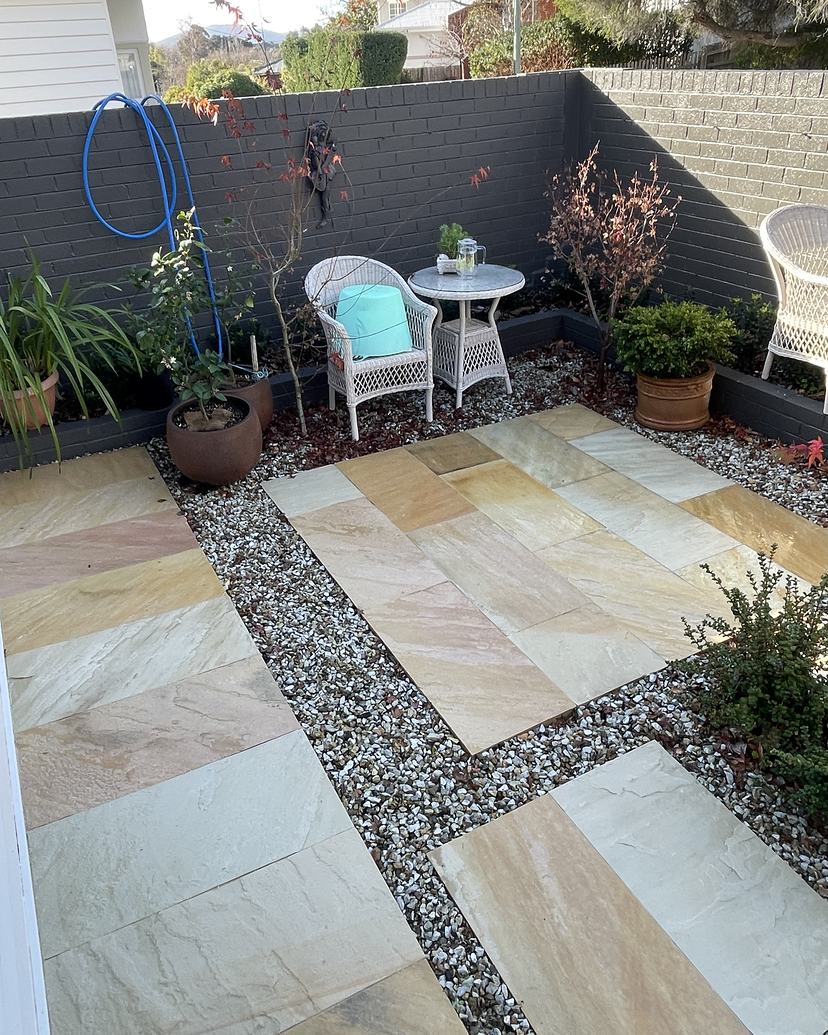 Clean sandstone pavers in a Dynnyrne courtyard after cleaning