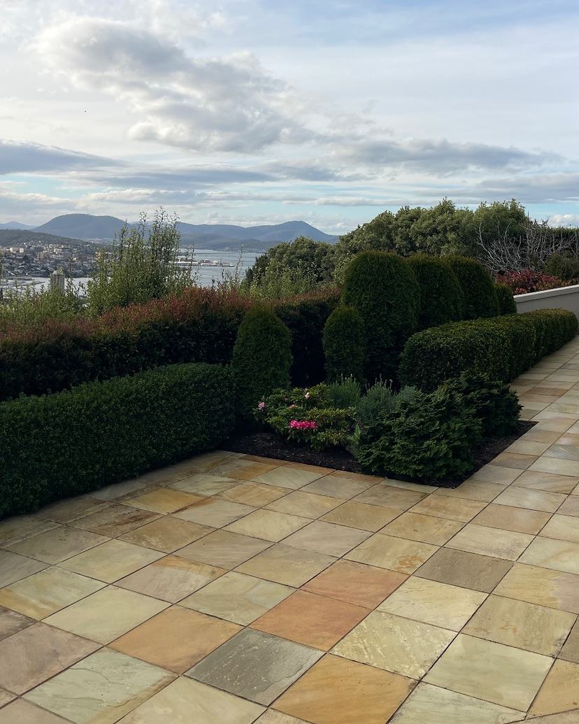 The same Sandy Bay sandstone terrace after soft washing