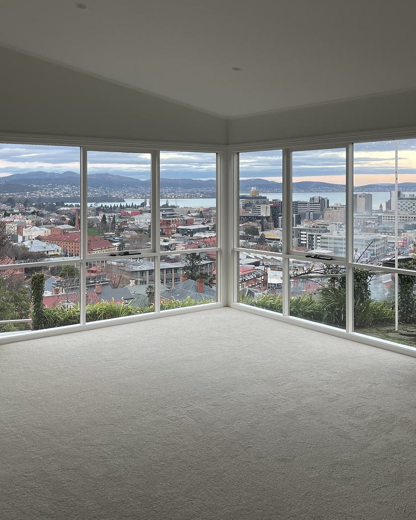 Spotless corner windows in West Hobart looking over the Hobart city skyline